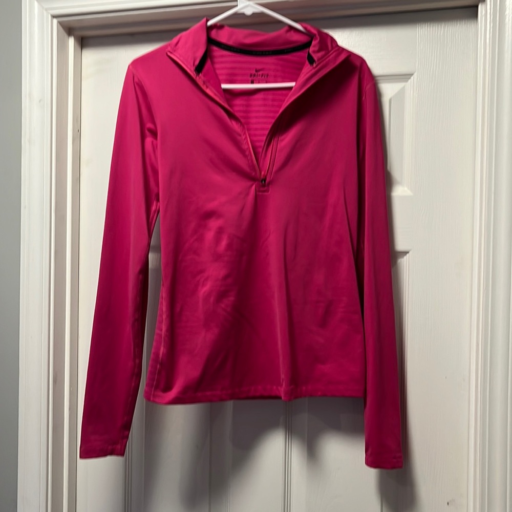 Medium, form fitting, Nike quarter zip.